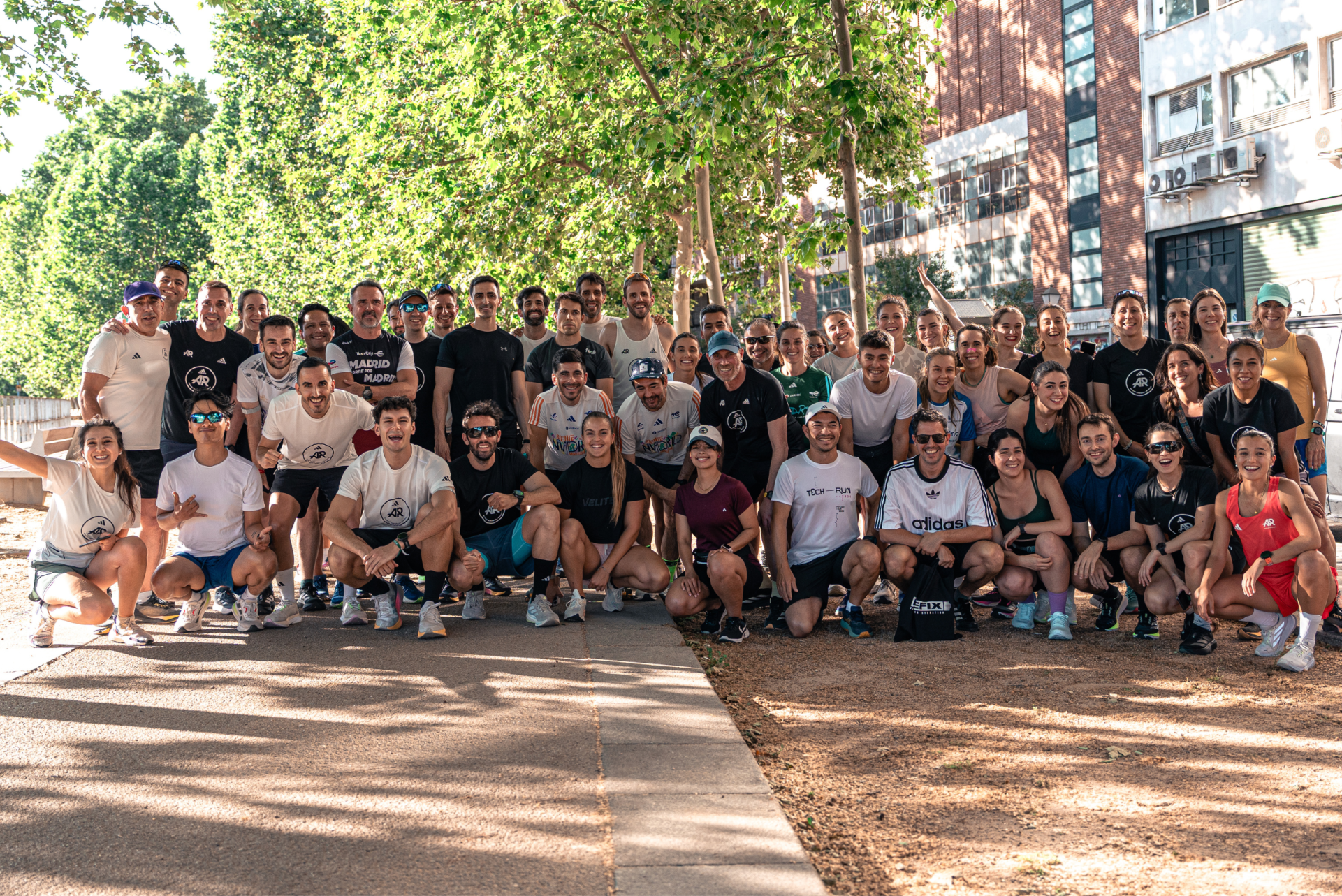 A group of friends celebrating after tech run.